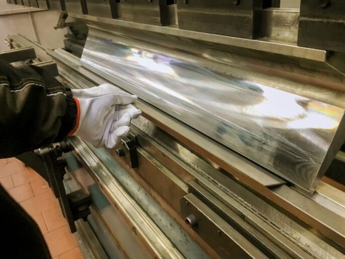 Sheet industrial metal bending in factory machine in metal fabrication