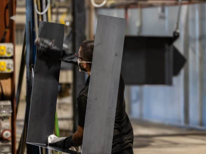 Preparing steel panels before powder coating at MorFab